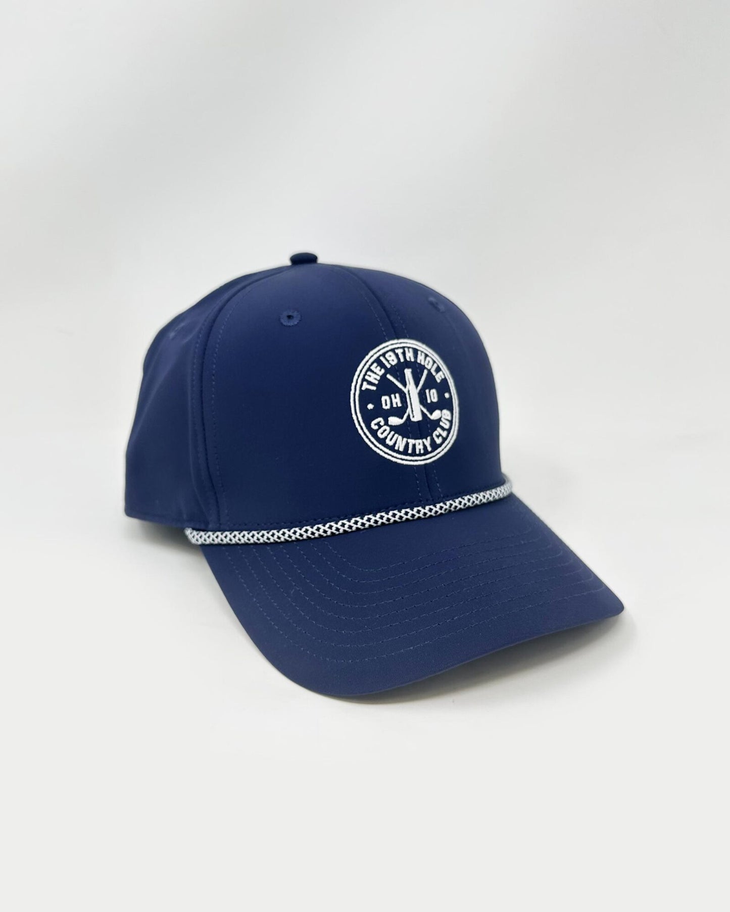 The 19th Hole Country Club Crest Trucker Hat