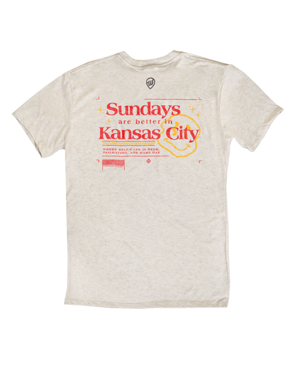 Beige t-shirt with 'Sundays are better in Kansas City' text on a white background