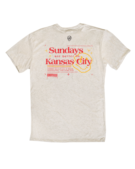 Beige t-shirt with 'Sundays are better in Kansas City' text on a white background