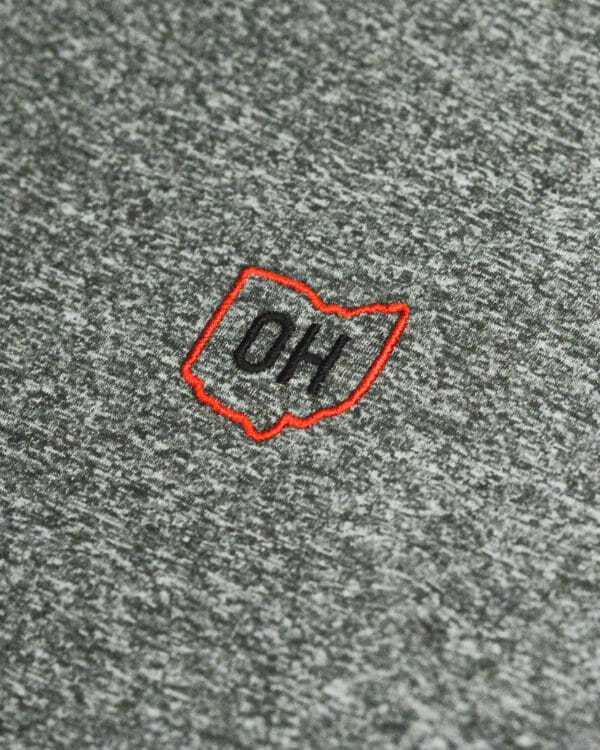 This enlarged image displayed the embroidered "OH" letters inside of the outline of the shape of the State of Ohio.