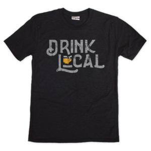 This shirt features drink local design in gray on a black crew.
